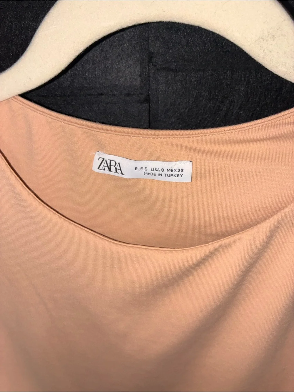 Zara women’s Peach Tank One-Piece Bodysuit. High neck, stretch snap closure.